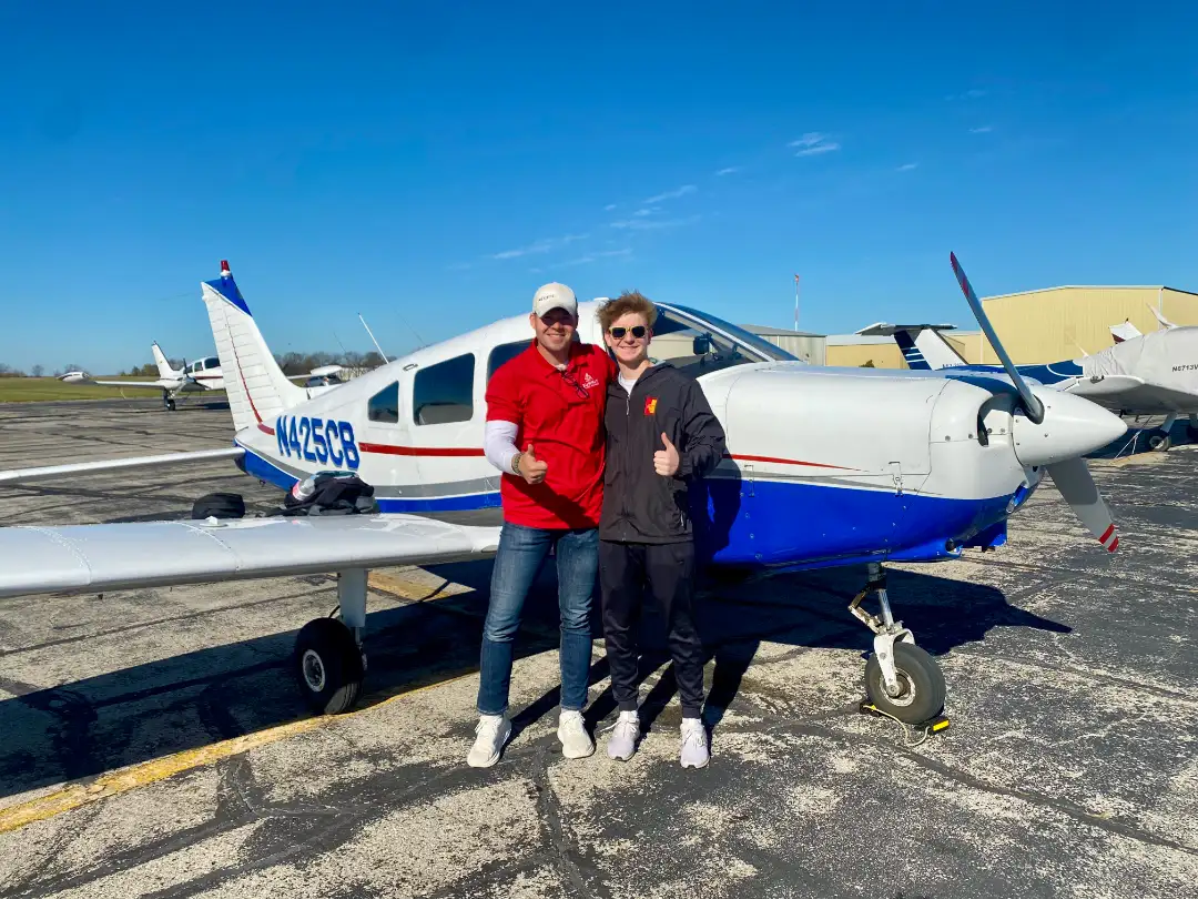 Summit Flight Academy student in front of Piper PA-28 Cherokee