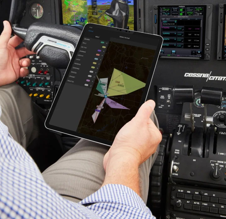 A student pilot using ForeFlight app on an iPad in a Piper Cherokee cockpit