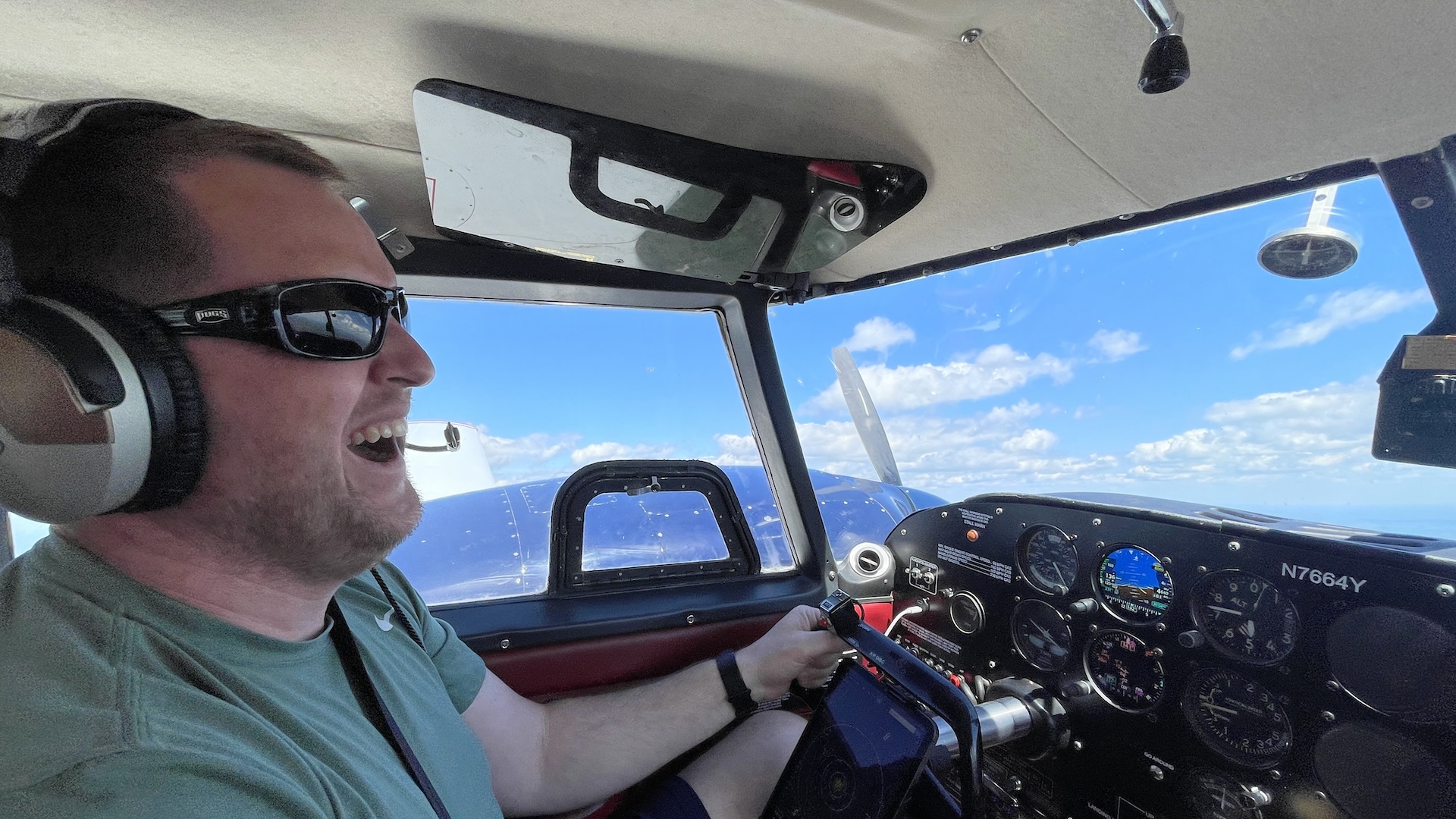 Excited pilot flying an aircraft over Leawood, Kansas
